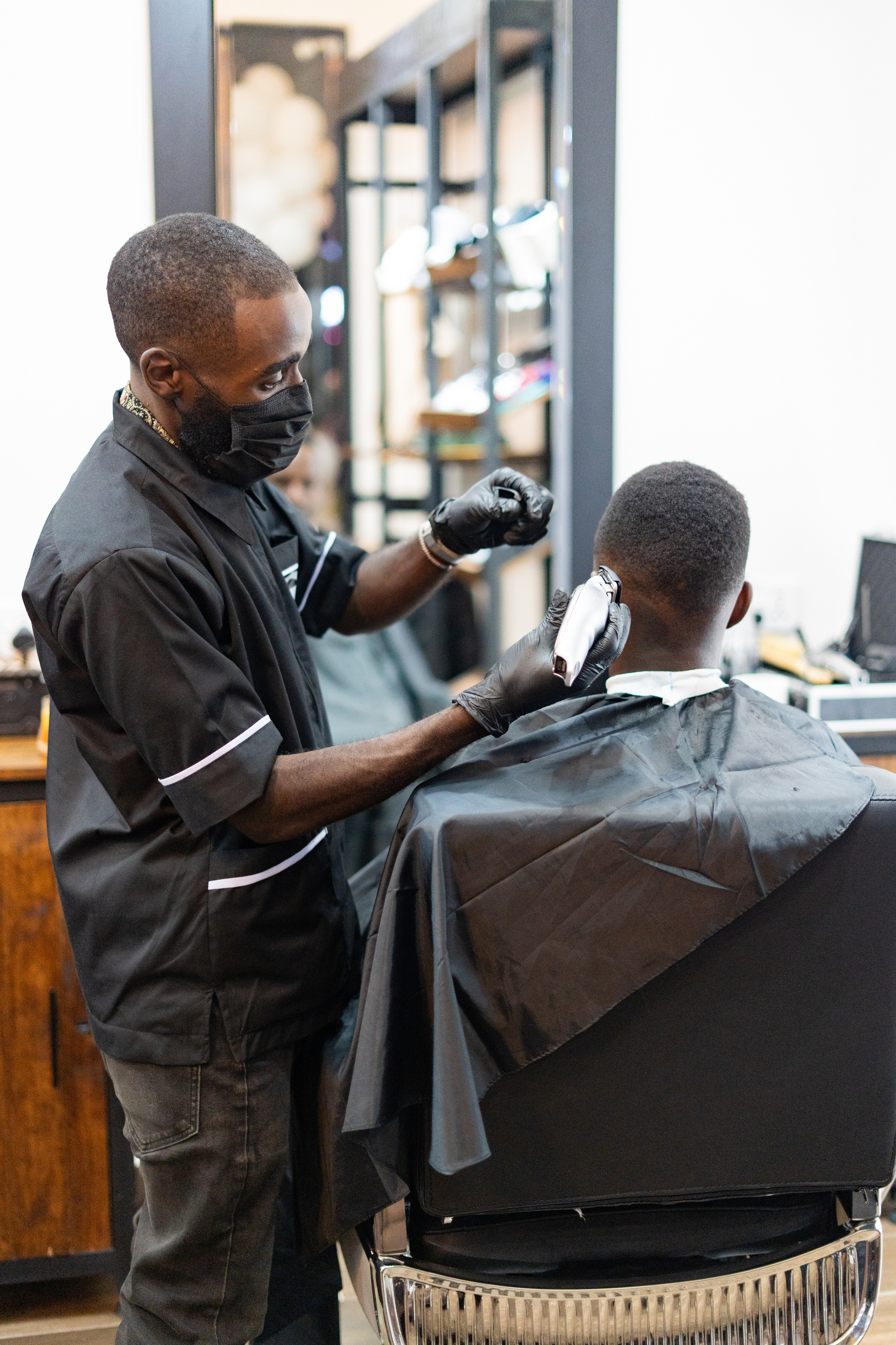 Professional barber cutting hair